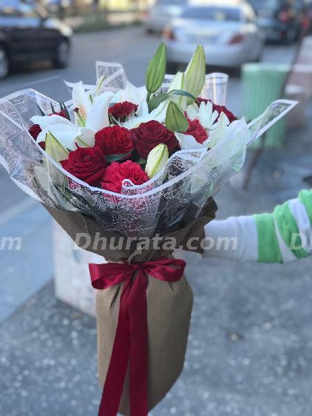 Mix of gerberas, roses, carnations and lilies