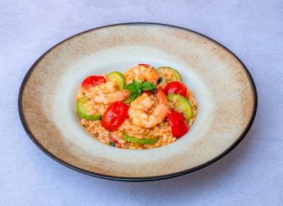 Risotto with shrimp, zucchini, cherry tomatoes